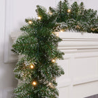 Silensys 18ft Christmas Garland with Battery Operated 50 LED Lights and Timer Snow Flocked Christmas Decorations Xmas Garland for Stairs Fireplaces Wall Door Xmas Garland