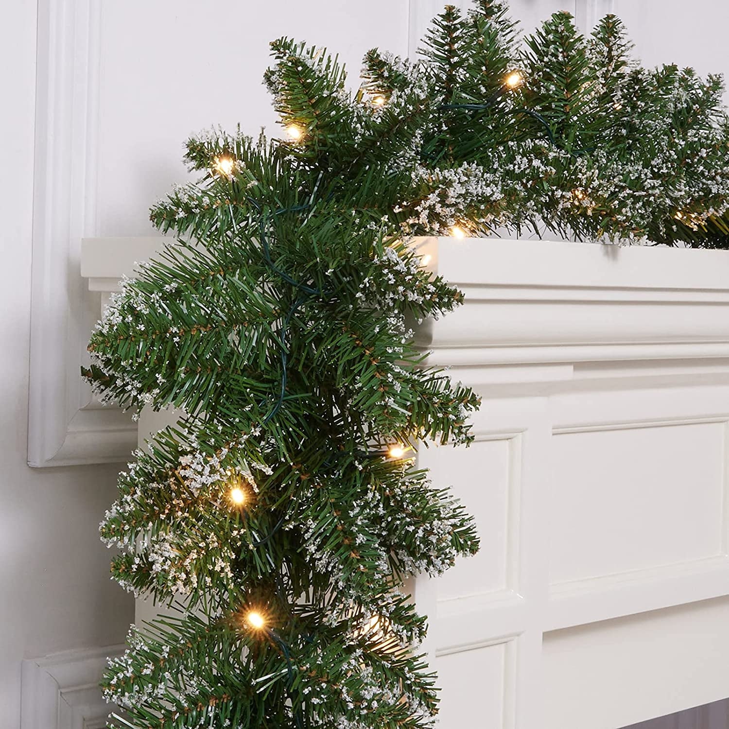 Silensys 18ft Christmas Garland with Battery Operated 50 LED Lights and Timer Snow Flocked Christmas Decorations Xmas Garland for Stairs Fireplaces Wall Door Xmas Garland