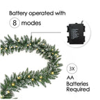 Silensys 18ft Christmas Garland with Battery Operated 50 LED Lights and Timer Snow Flocked Christmas Decorations Xmas Garland for Stairs Fireplaces Wall Door Xmas Garland